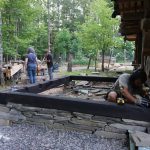 Stone foundation for a screened in porch.